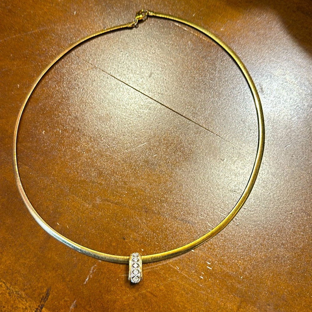 Women’s gold colored necklace with cz pendant
